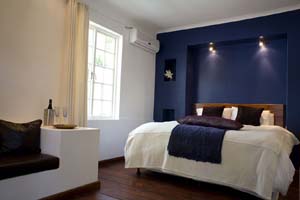 Deluxe 2 room double or twin with mountain view, king bed, private facilities (bath and shower), and breakfast